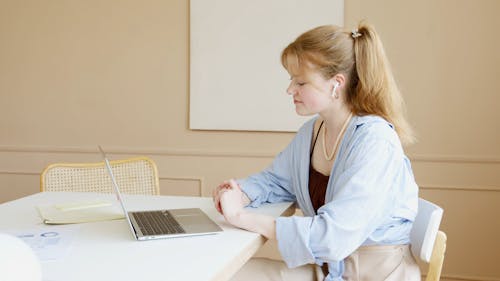 A Woman Looking on Her Laptop