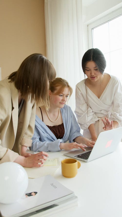 Female Colleagues Working Together in an Office
