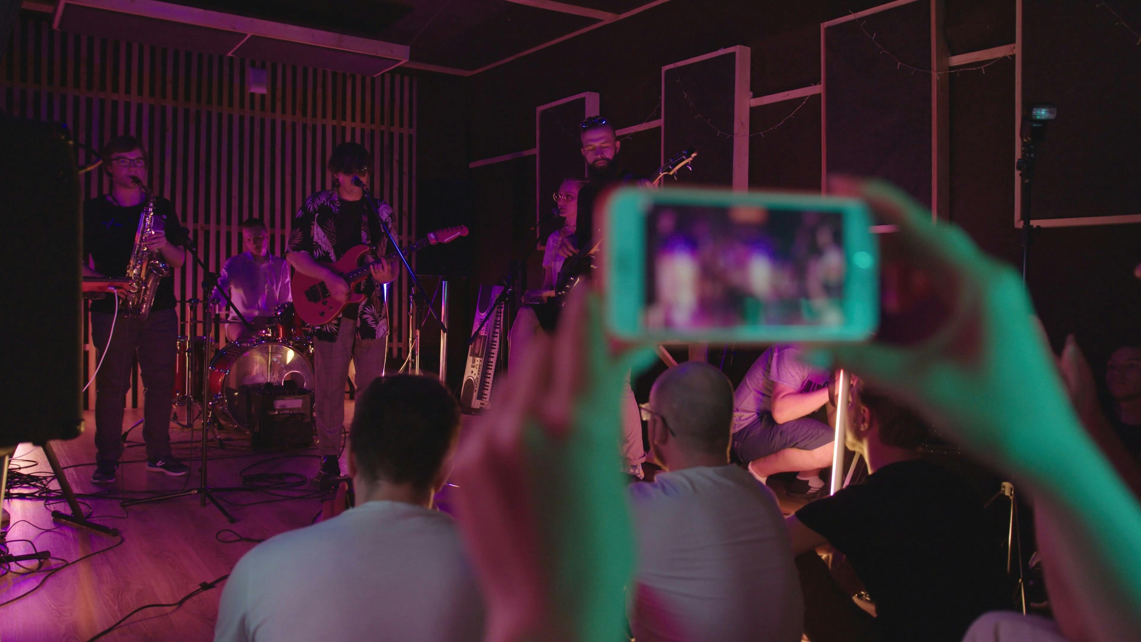 A Group Of Musicians Performing Live On A Stage · Free Stock Video