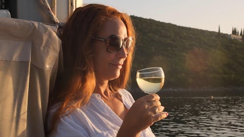 A Woman Drinking White Wine