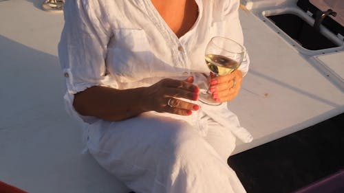 A Woman Drinking White Wine