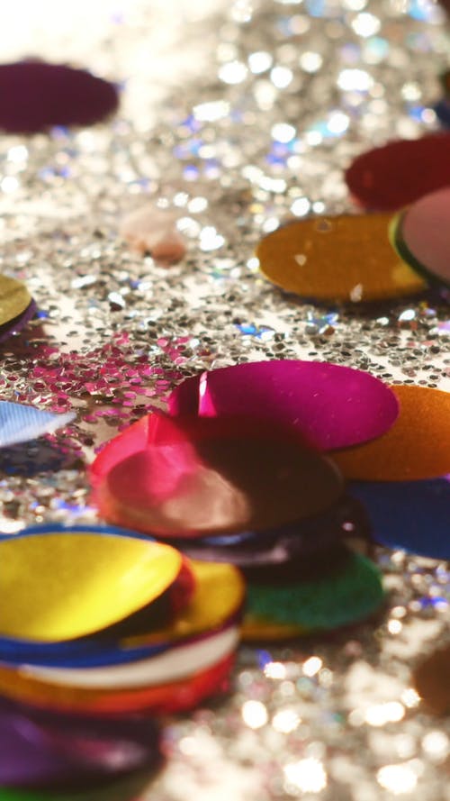 Various Shiny Objects Falling on a Surface