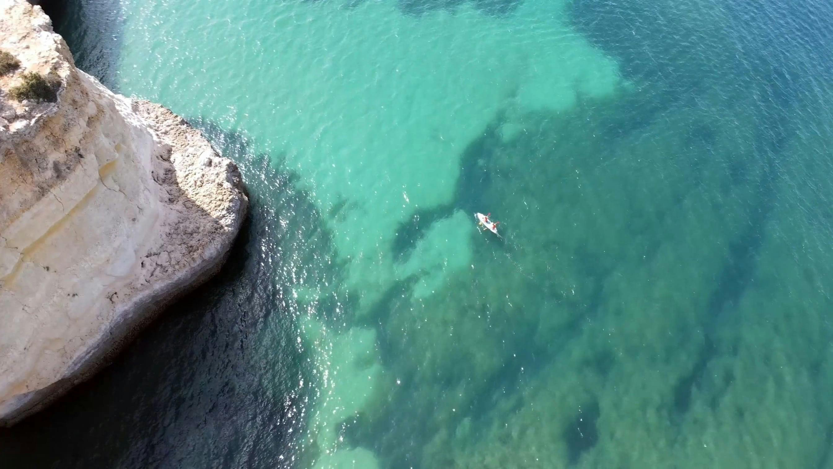 Birds Eye View of People Kayaking in Benagil Free Stock Video Footage