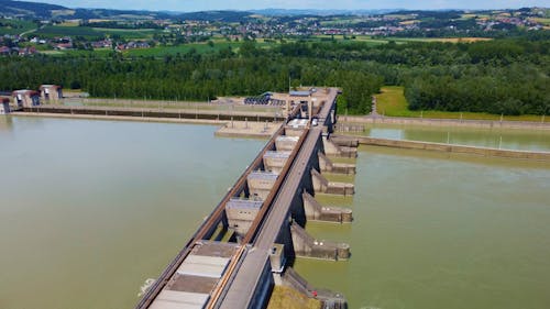 Aerial Footage of a Bridge Over a Dam