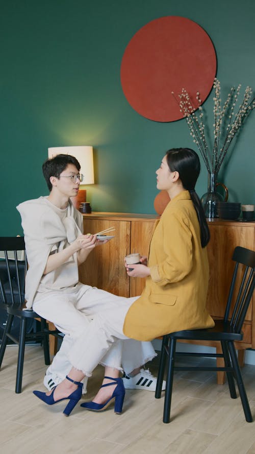 A Man and a Woman Having a Coffee Break Together