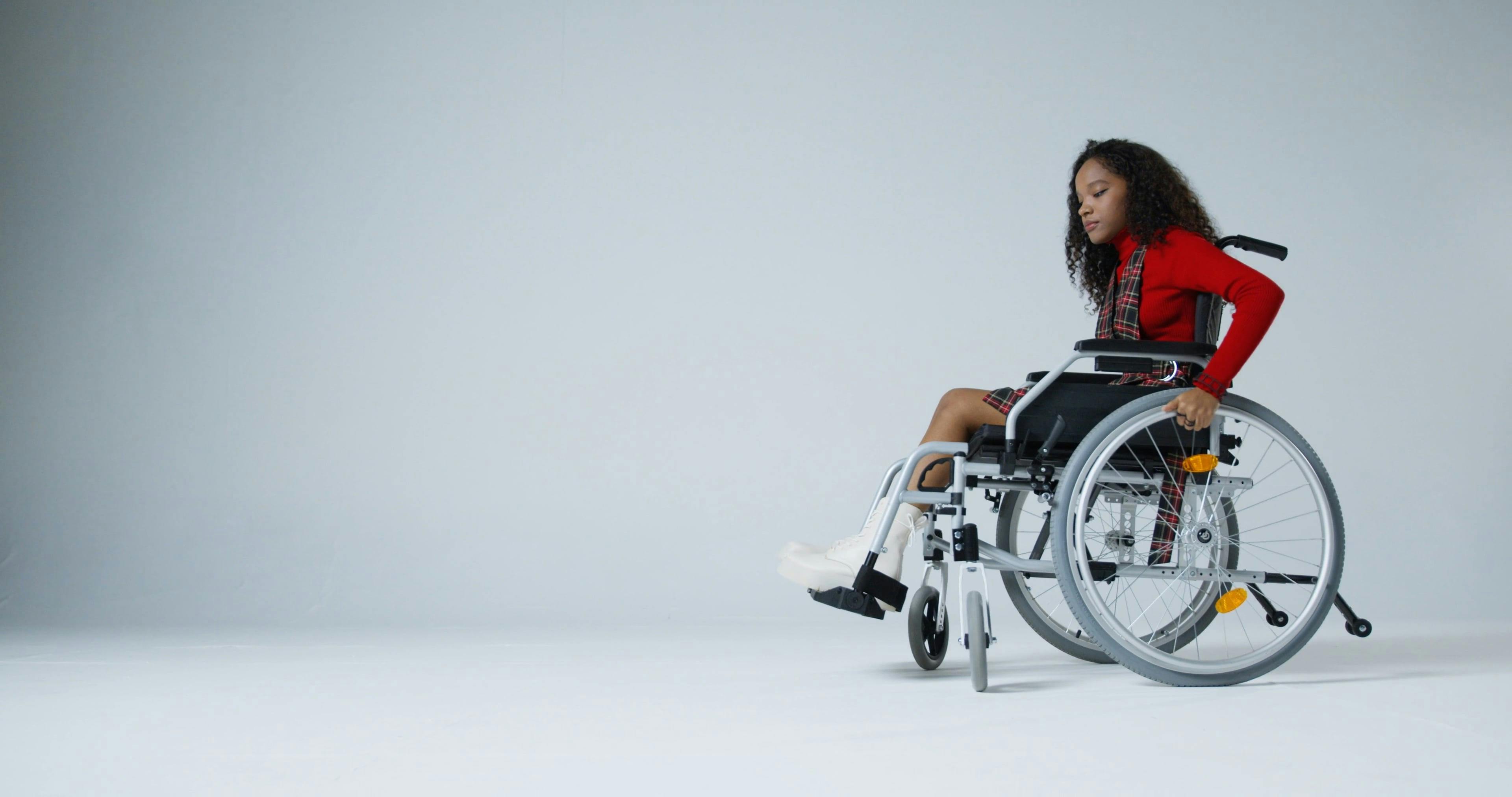 A Woman Sitting on Wheelchair · Free Stock Video