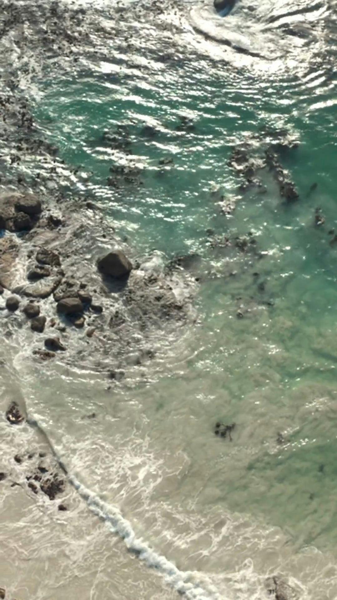 Birds Eye View of Crashing Waves on the Rock · Free Stock Video