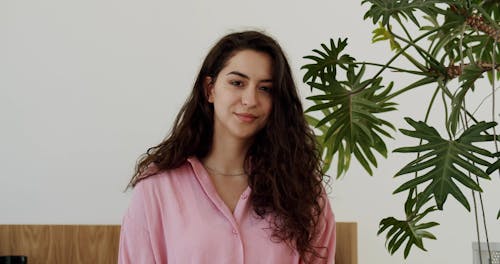 A Female Posing in an Office