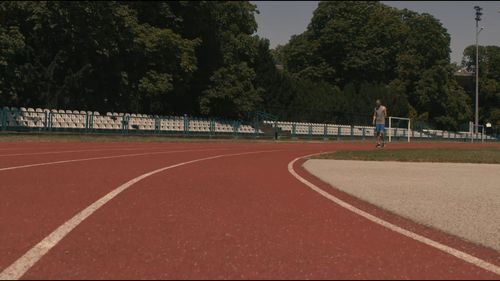 A Ground Level Shot of a Runner at the Starting Line · Free Stock Video