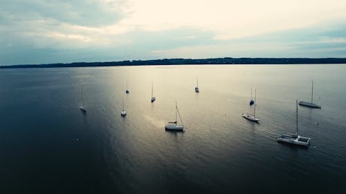 Aerial View of Sailboats on Body of Water