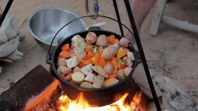 cooking vegetables with wine in a pot