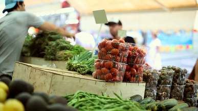 customers buying in a market