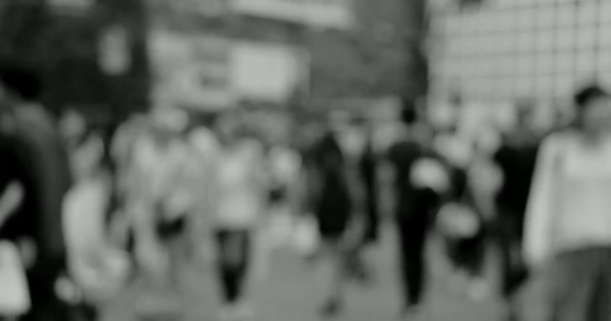 black and white video of a busy street 853946
