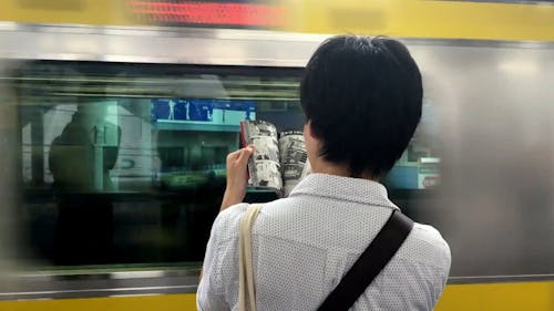 Person Reading While Waiting