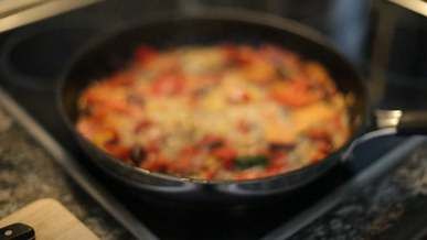 cooking meat in a pan