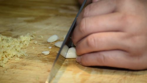 Chopping Garlic And Onion Leaks