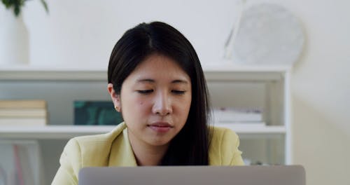 A Close up of a Bored Woman in an Office