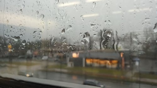 Time Lapse Video Of Cars Passing On A Rainy Day