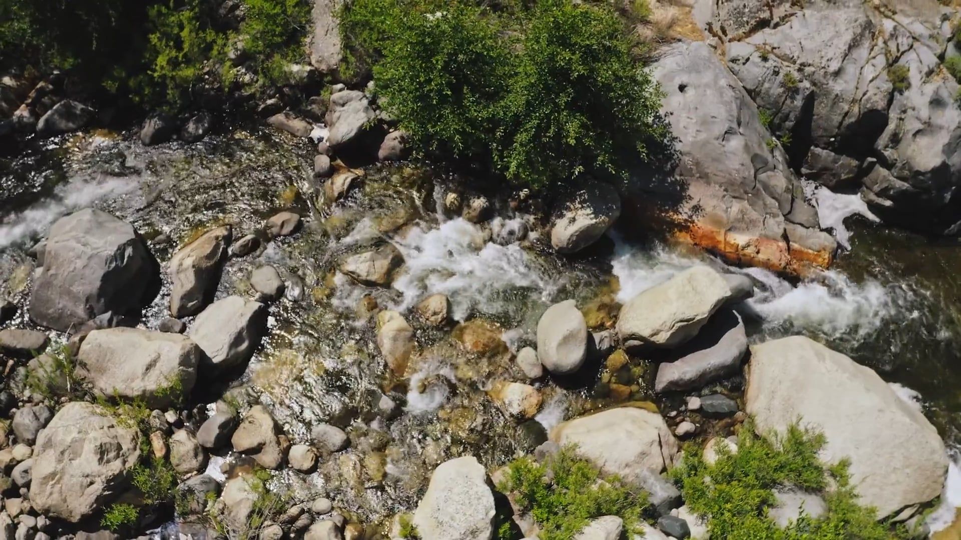 A Beautiful Drone Footage of a Lake with Solid Rocks Free Stock Video ...