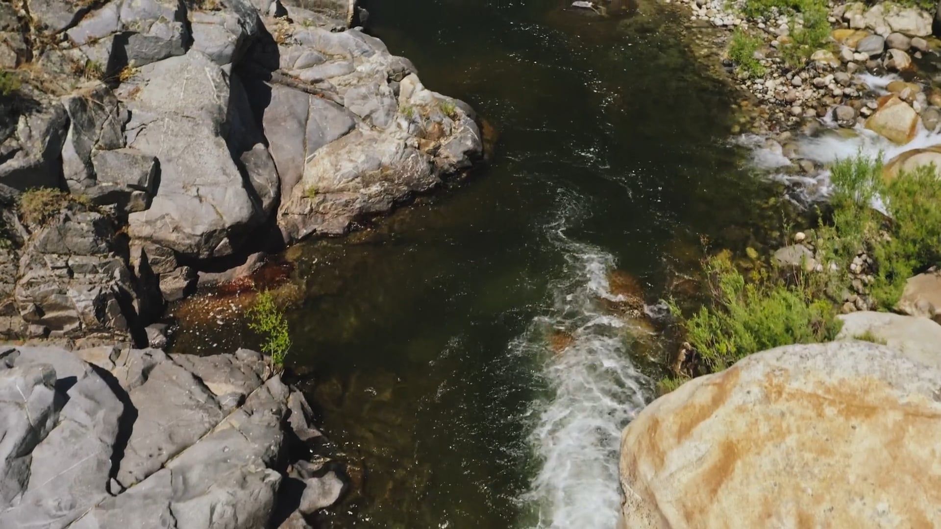 A Beautiful Drone Footage of a Lake with Solid Rocks Free Stock Video ...