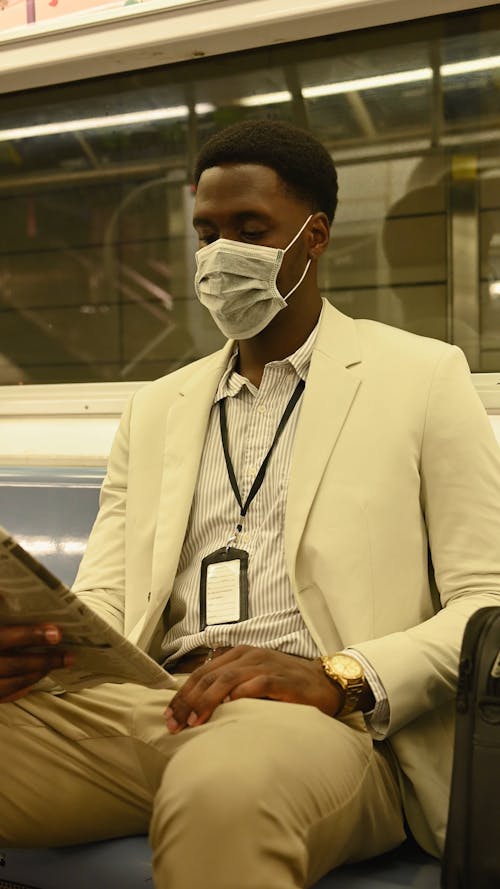 Man Wearing Face Mask Inside the Train