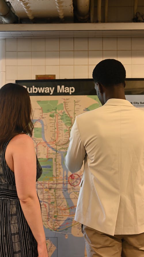 People Looking at a Map