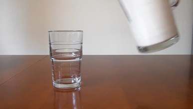 video of milk being poured in glass