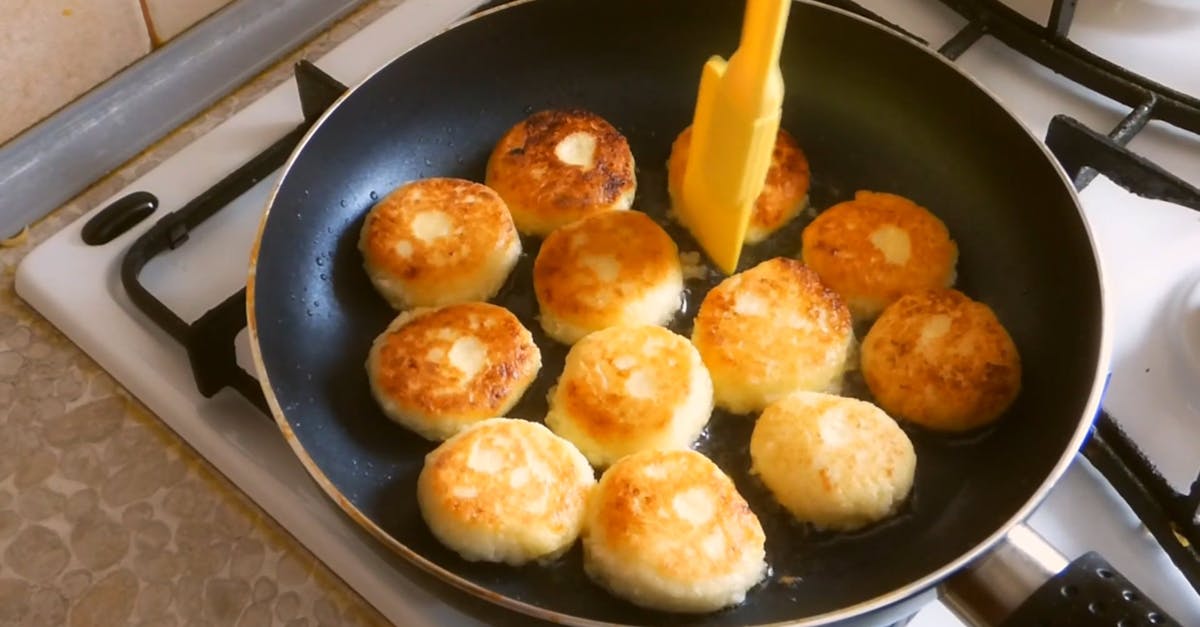 Frying Round Hash Browns · Free Stock Video