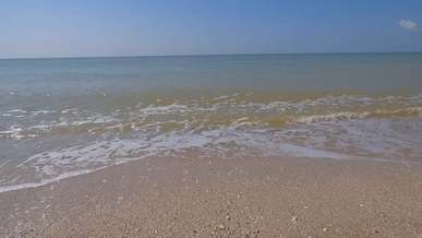 beach waves hitting shore