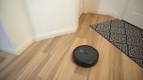 A Robotic Vacuum Cleaning The Corners of the Flooring