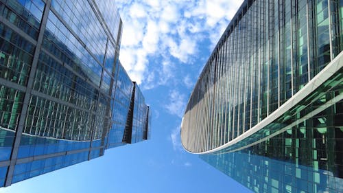 Low Angle Shot of High Rise Buildings