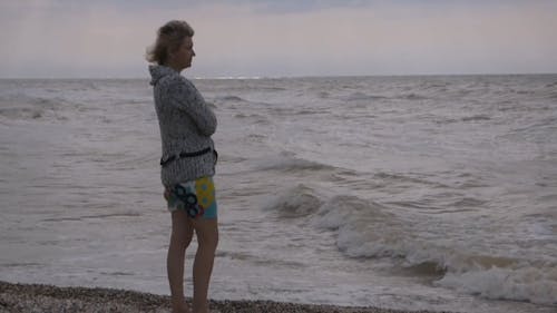 Woman By The Shore