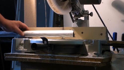 Man Using Pendulum Saw