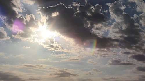 Clouds And Rays Of Sun