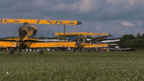 Air Show Exhibition of Two Yellow Biplanes