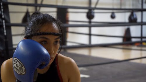 Close-up Video of a Woman Punching