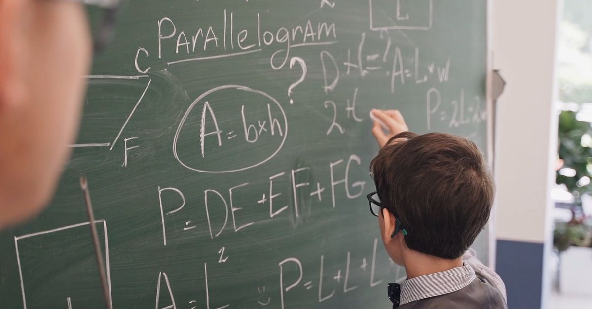 Student Math Answer Student Answering a Math Problem on the Blackboard Free Stock Video ...