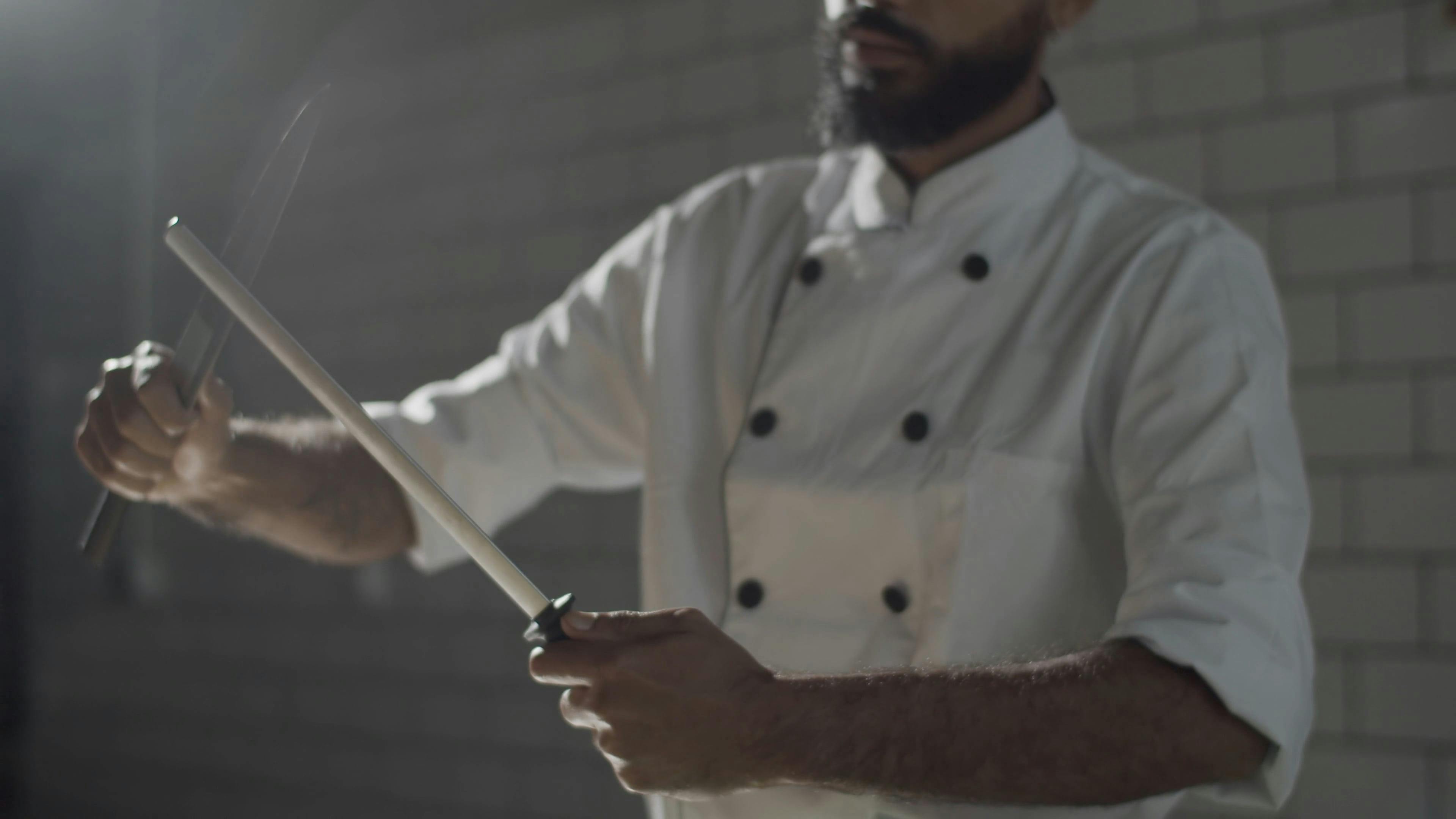 A Chef Trying To Sharpen His Knife · Free Stock Video