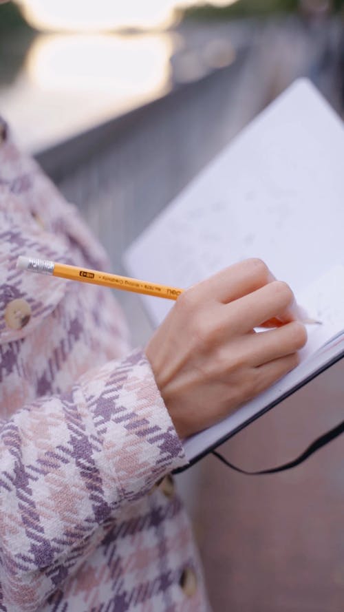 Close Up Video of a Person Taking Notes