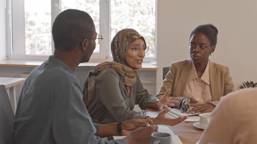 Woman Talking in a Meeting