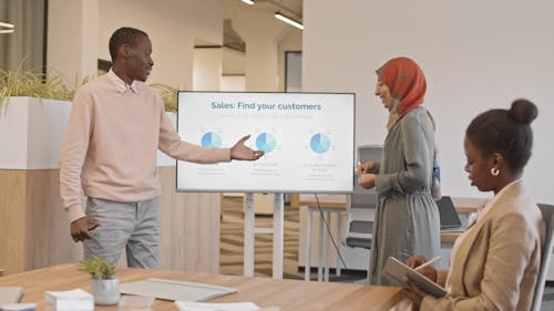 Man Presenting in a Meeting