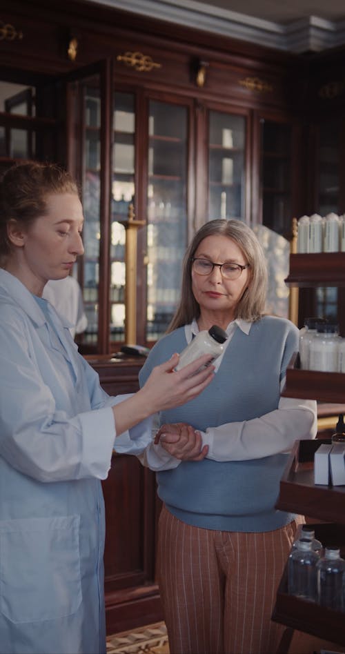 A Pharmacist Assisting a Customer