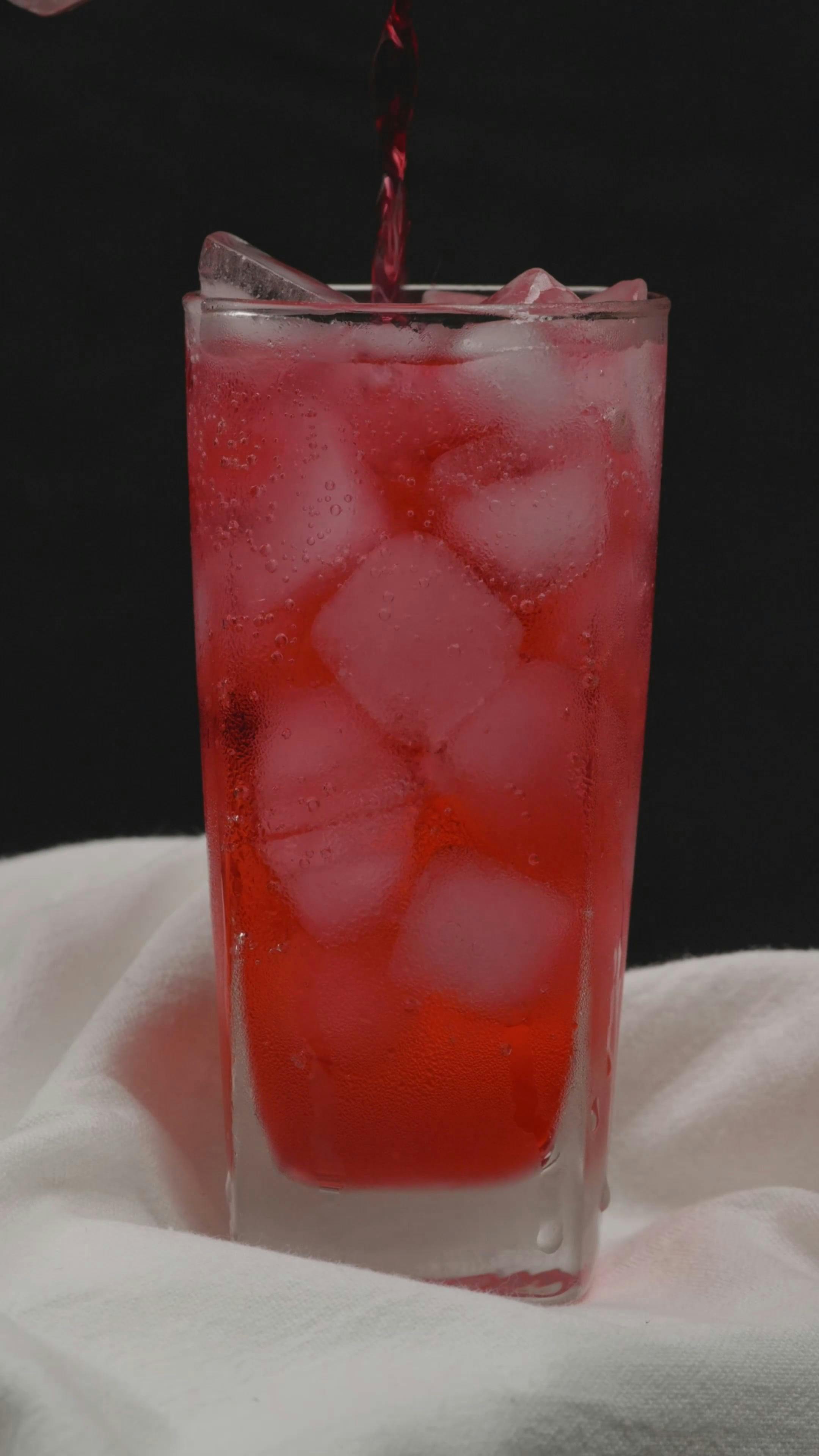 A Person Pouring Red Liquid in the Glass · Free Stock Video