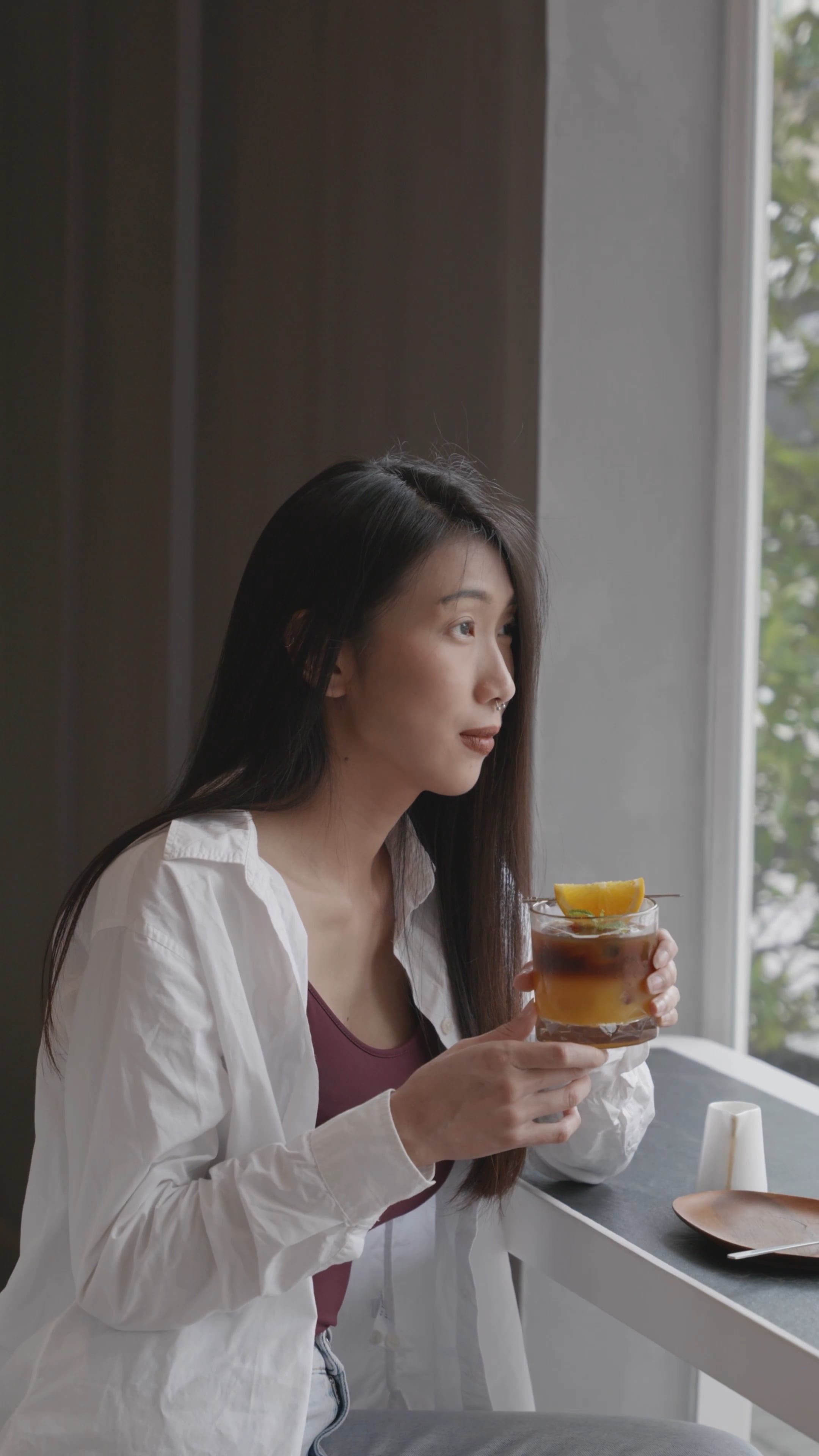 woman holding a drink 8677705 — free pexels stock footage