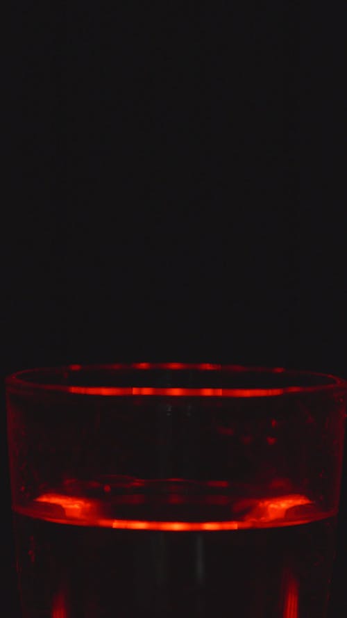 Ice Cubes Dropped on a Glass of Water