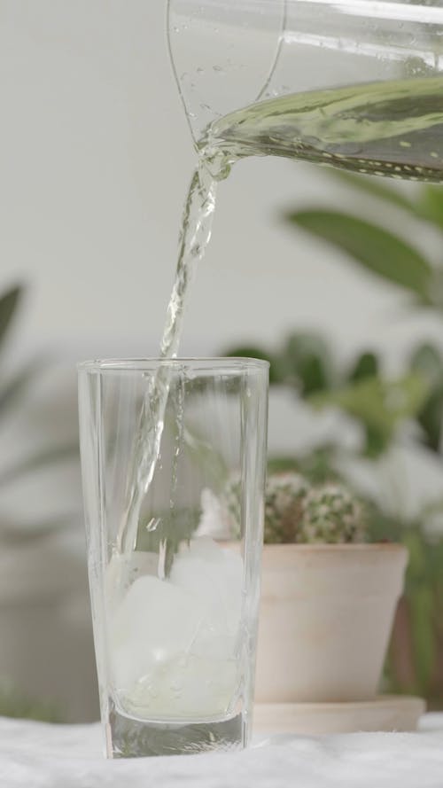 Pouring Water on a Drinking Glass