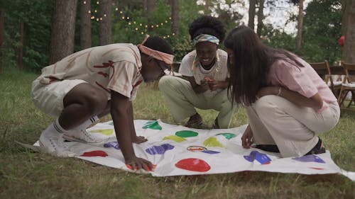 A Group of Friends Playing Twister
