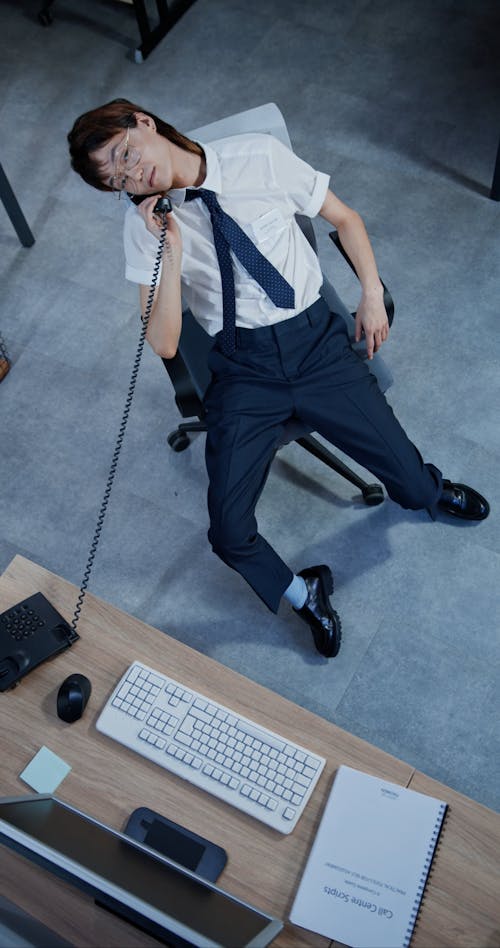 A Man Working in a Call Center