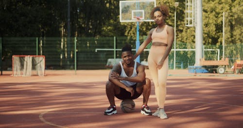 Man and Woman on a Basketball Court