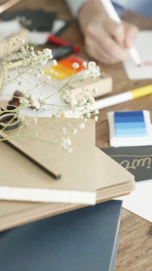 Close Up Video of a Person Writing on a Card